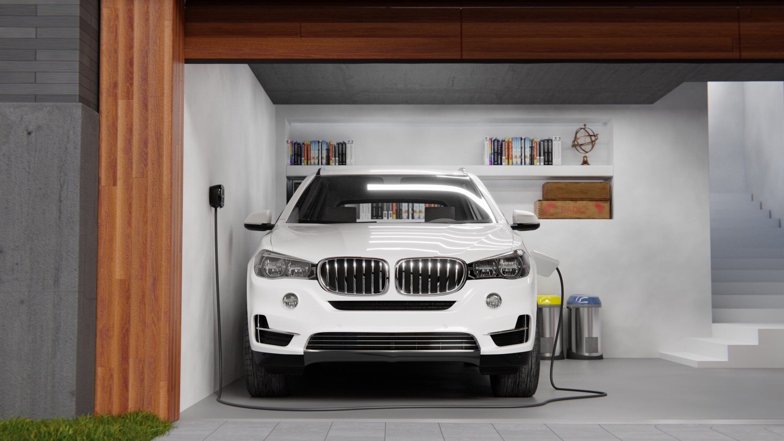 Vehículo eléctrico cargando en garaje de vivienda unifamiliar